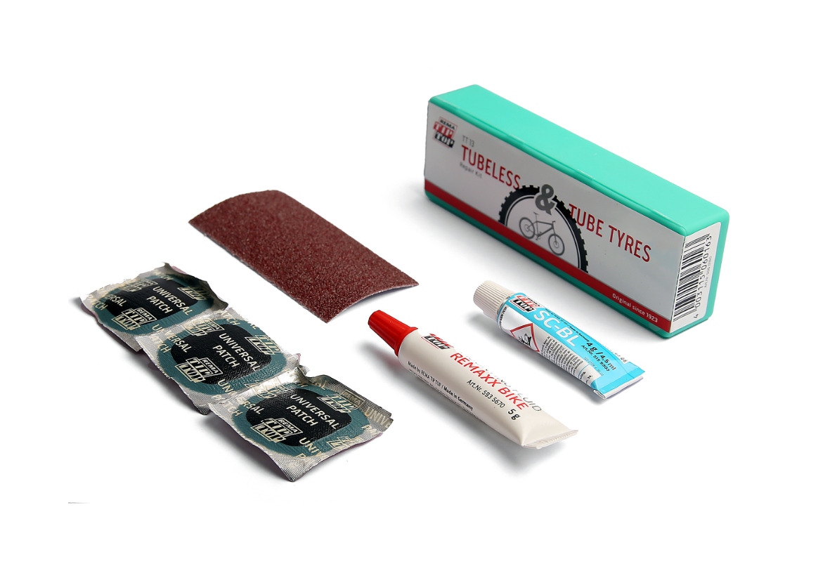 rema Tip Top reparationssæt til tubeless. 3 stofforstærkede lapper (Ø 30 mm), 4 gr. lim sandpapir & Remaxx Bike til montering af dæk.